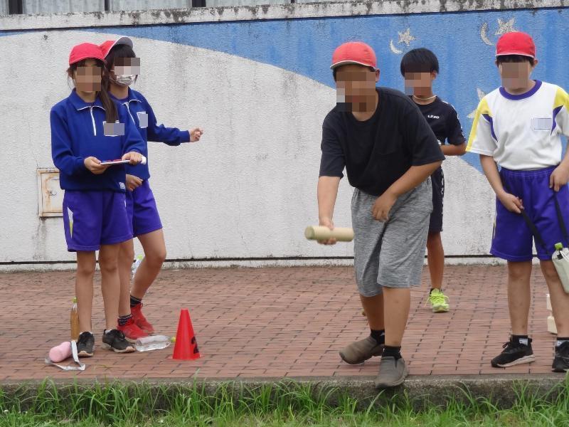 投げる